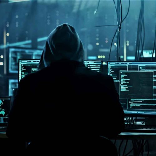 Student working on computer for cybersecurity training