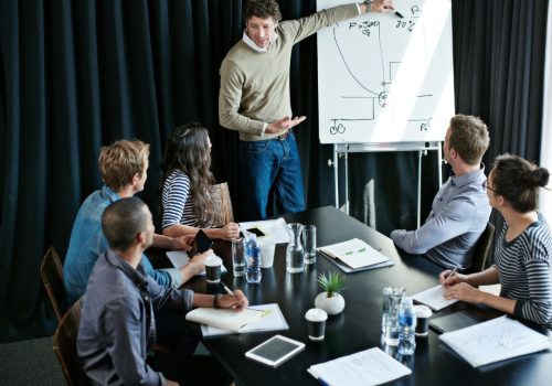 Team of professionals discussing strategies in a meeting